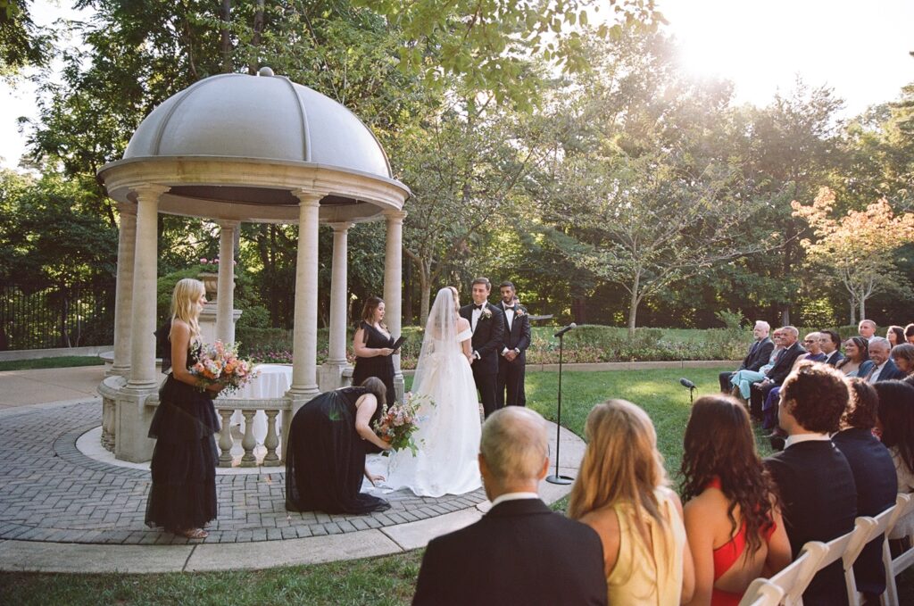 sunshine behind a couple during their wedding ceremony