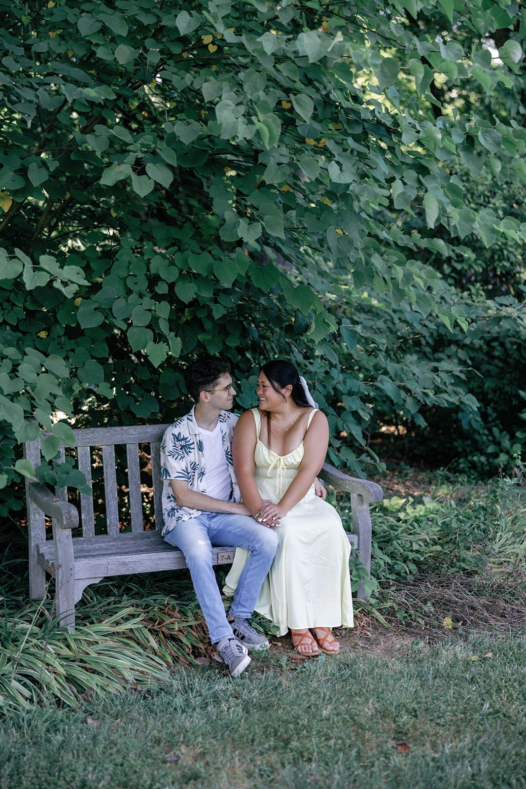 Meadowlark Botanical Garden engagement couple on bench
