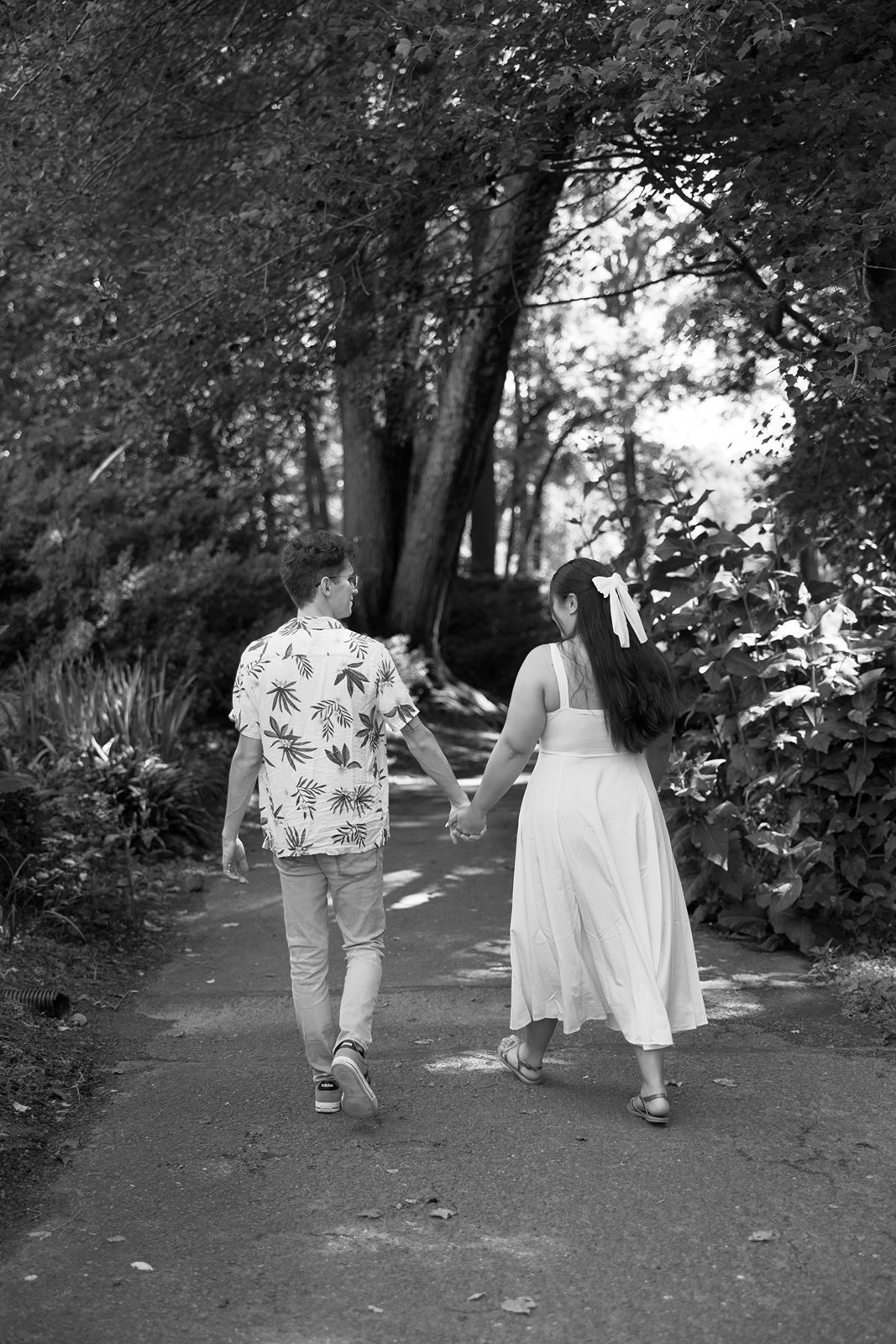 Meadowlark Botanical Garden engagement couple walking